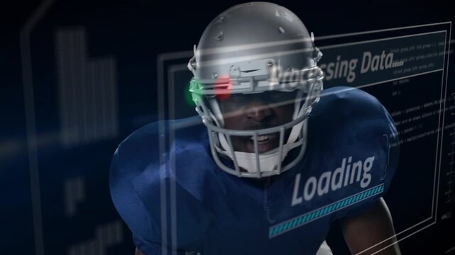 Male football player raising head on HUD load, shouting and touching helmet to signal sports tech