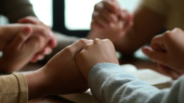 Group of people praying. Christian worship and pray. Christian group of people holding hands praying worships together to believe