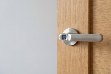 Modern smart door handle with biometric fingerprint scanner. Close up