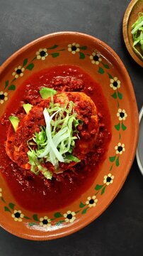 Mexican food, traditional pambazo or chancla poblana, rotating camera