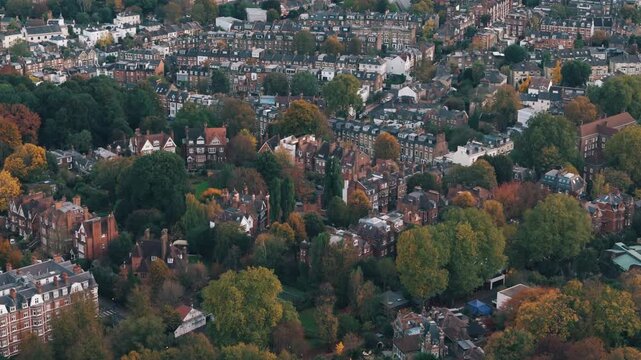 Grand homes emerge beneath autumn trees in Hampstead village