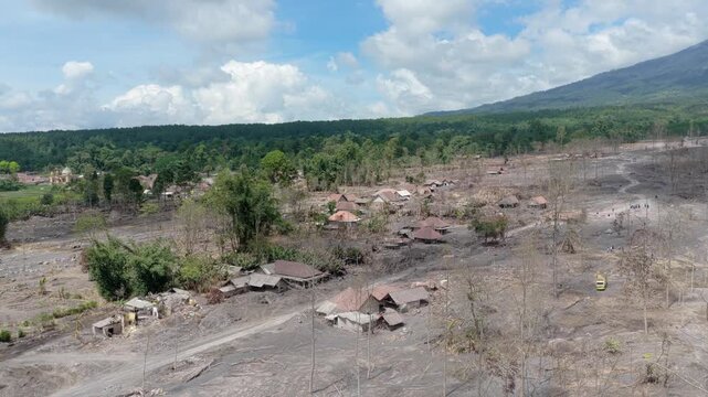 Aerial view of a village in lumajang, east java, indonesia, devastated by a lahar mudflow from the eruption of mount semeru volcano