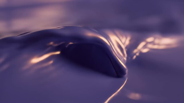 Abstract macro of liquid wave crest rising and falling slowly with purple and gold lighting