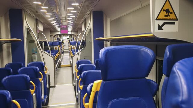 Empty train carriage of modern business class railway carriage. No people.