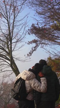 LGBTQ Couple Exploring Japanese Nature in Autumn