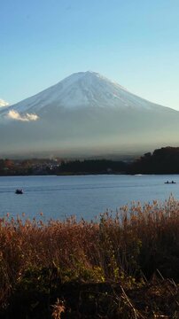 Peaceful lake view with Mount Fuji and autumn foliage