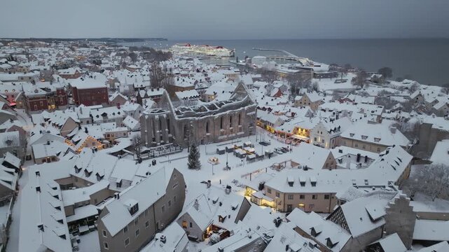 Winter Evening Drone Approach to Stora Torget and St Karin Ruin Visby Old Town
