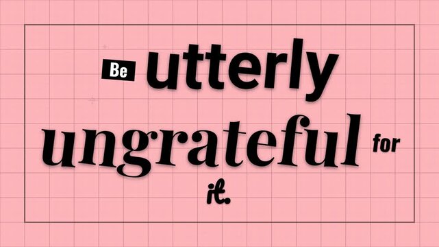 Animated black text forming a motivation quote on a pink grid background suitable for business