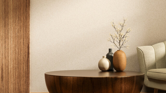 Flower vases on round base wooden table and fabric sofa couch aside white wall in modern living room