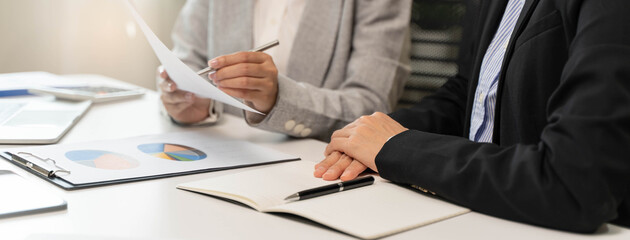 Financial consult planning investor asses and present to client, Close up shot client and advisor...