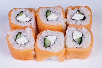 Gourmet sushi rolls with precise cuts and elegant presentation, fine dining vibe, minimalist white plate, subtle shadowing, refined texture highlighting quality ingredients © beholdereye