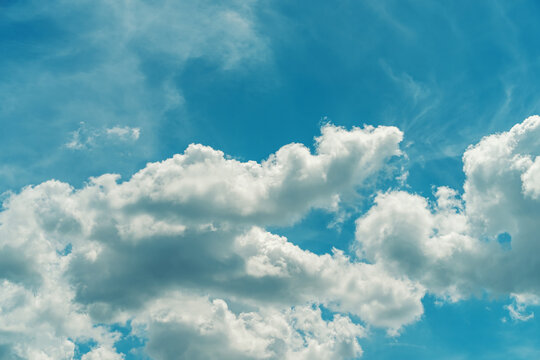 blue sky background with tiny clouds