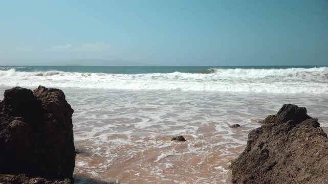 Mōkapu Beach. Basanite and minor picrobasalt Lava flows, Kula Volcanics. Wailea Beach Paths, South Maui, Hawaii. Coastal erosion, Pacific Ocean.  
