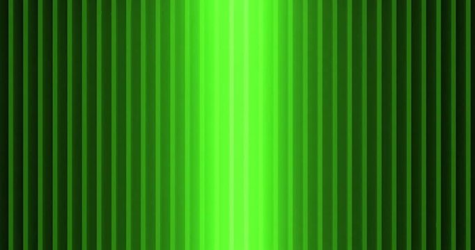 Bright green light beam illuminating vertical striped pattern in a dark environment