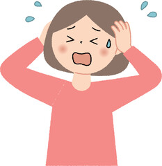 頭を抱えて困っている若い女性