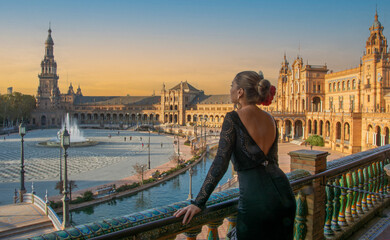 a beautiful Andalusian woman observes the wonderful Seville at sunset © corradobarattaphotos