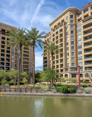 Modern buildings a canal and recreational area Scttsdale AZ.