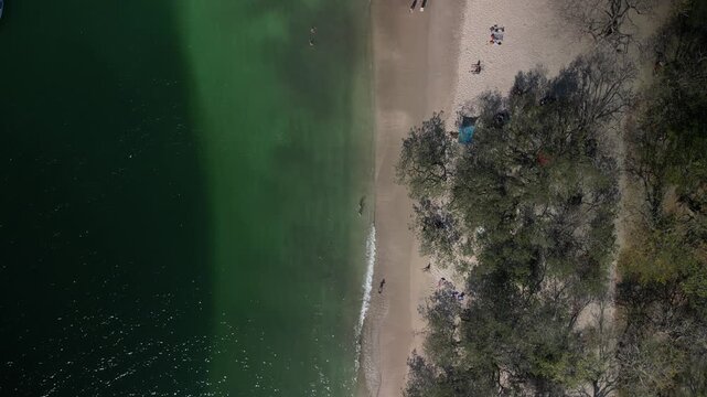 Top down drone view of Playa Conchal Costa Rica next to turquoise water
