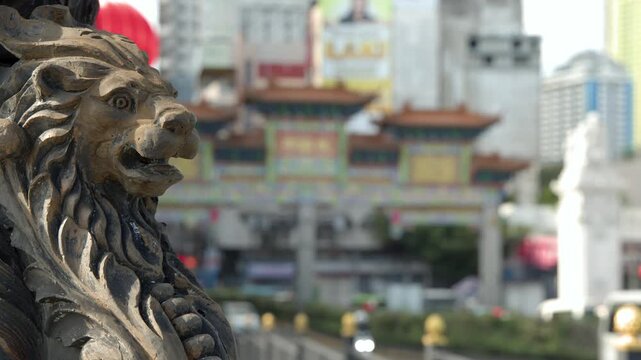 Stone Guardian Lion Statue at Binondo Chinatown Archway in Manila