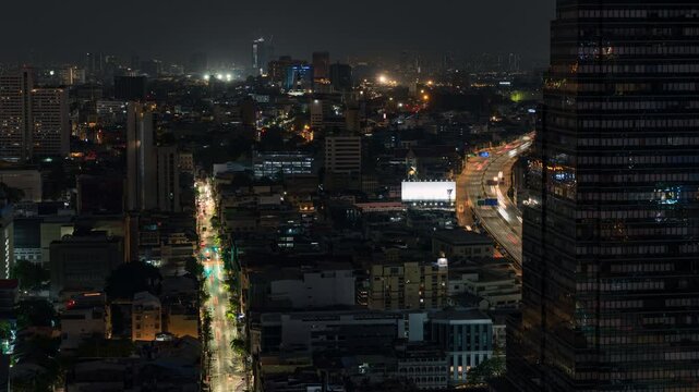 Nighttime timelapse shot looking North from the State Tower in Bang Rak, Bangkok