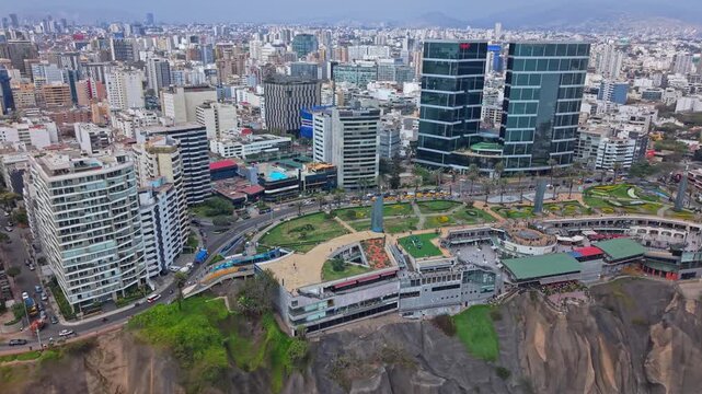 Panning shot of Larcomar mall on Lima's coastline in vibrant Miraflores