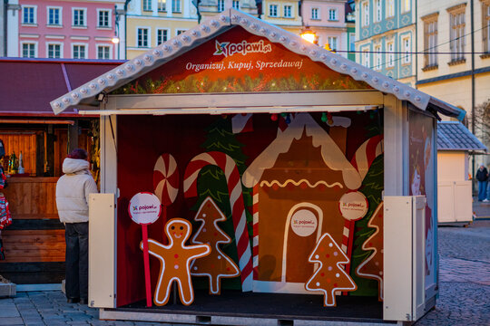 Festive gingerbread-themed hut and photo point at the Wroclaw Christmas Market &ndash; attractions for children, colorful decorations, and winter atmosphere in the historic Wroclaw Market Square