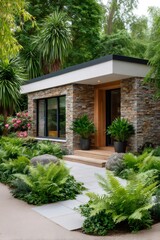 Fototapeta premium Modern garden room building with stone facade and lush plants