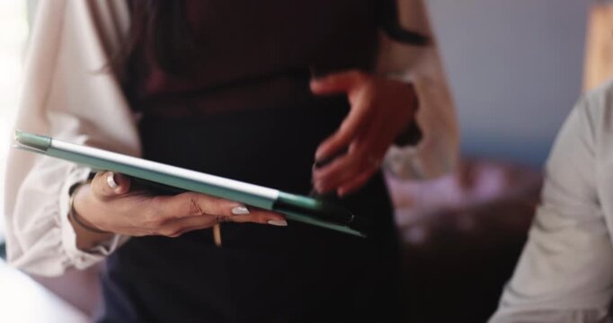 Cafe, hands and waitress with tablet for decision, online menu and suggestion. Small business, employee and digital app in coffee shop for hospitality, service or help with man for order or choice