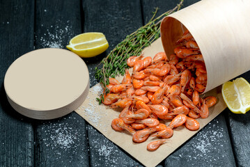 Cooked Shrimp with Lemon and Thyme on Rustic Wooden Table