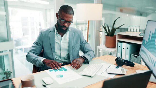 Computer, trader and black man in office, reading or email for audit review, internet or investment deal. African person, documents or financial advisor in workplace, pc or checklist for trading info