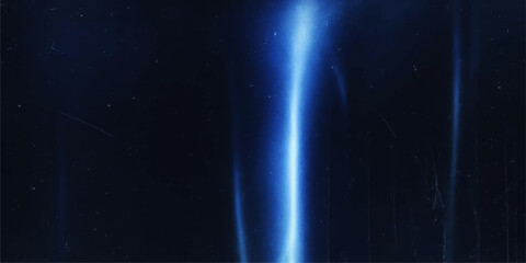 Abstract Blue Light Effect: A striking display of blue light beams, a captivating visual that conveys a sense of energy, mystery and dynamic movement. © FANUSH