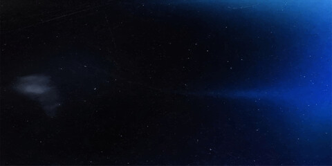 Fototapeta premium Cosmic Whisper: A mesmerizing display of celestial artistry, where deep blues and shimmering particles create a captivating interstellar narrative.