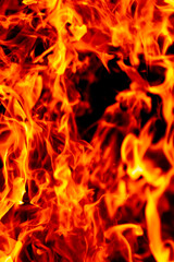 Fototapeta premium Fire on black background. Fire sparks. Fire background. Fire glowing effect.