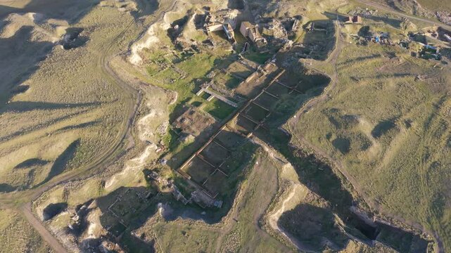 Cinematic aerial drone video of Gordion Ancient City near Polatli in Ankara, Turkey, showcasing the Midas Tumulus, ancient ruins, and wide historical landscape from above.