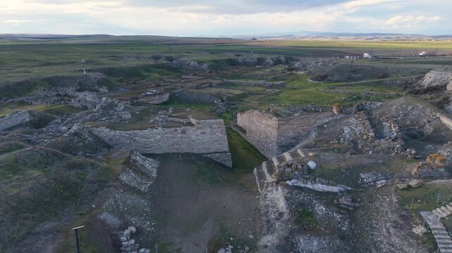 Cinematic aerial drone video of Gordion Ancient City near Polatli in Ankara, Turkey, showcasing the Midas Tumulus, ancient ruins, and wide historical landscape from above.