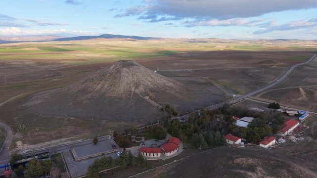 Cinematic aerial drone video of Gordion Ancient City near Polatli in Ankara, Turkey, showcasing the Midas Tumulus, ancient ruins, and wide historical landscape from above.