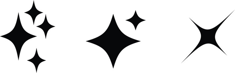 Obraz premium A collection of five black glimmering shapes resembling stars on a bright white surface