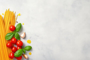 Fototapeta premium Spaghetti pasta with fresh cherry tomato, basil leaves, garlic cloves and olive oil on white background, Italian cuisine ingredients for cooking delicious meal