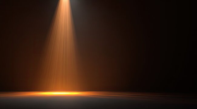Dramatic orange light illuminates a dark space, spotlighting the floor