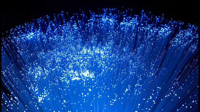 Abstract Blue Optical Fiber Wires Glowing on Dark Background for High-Speed Data Transfer