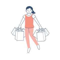 多数のショッピングバッグを持って歩く若い女性