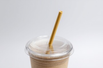 Paper Straw in Plastic Lid on Minimal White Background