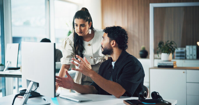 Man, woman and discussion with computer in office for insight, advice and review at media company. People, writer and editor with pc, planning or perspective for feedback with article at press agency