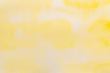 黄色の水彩絵の具でボカシながら描いた抽象的なテクスチャ01