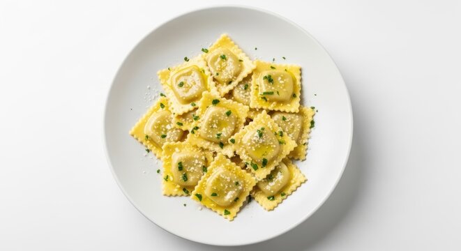 Delicious plate of freshly cooked cheese ravioli with herbs on white background