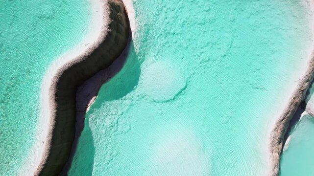 Drone view of Shenxianchi Scenic Area in Sichuan, China, near Jiuzhaigou and Huanglong, peaceful and clean water in pond among mountains, 4k real time footage travel concept.