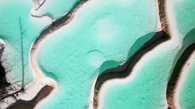 Drone view of Shenxianchi Scenic Area in Sichuan, China, near Jiuzhaigou and Huanglong, peaceful and clean water in pond among mountains, 4k real time footage travel concept.