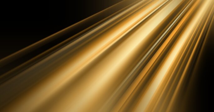 Abstract golden light streaks moving diagonally on black background. High-speed motion effect for luxury and technology designs