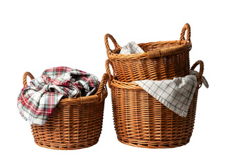 Obraz premium Three brown wicker baskets with plaid cloths isolated on transparent background