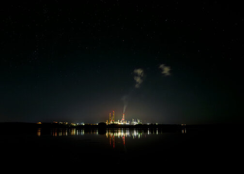 Valero Oil Refinery illuminated at night in Milford Haven Estuary Wales